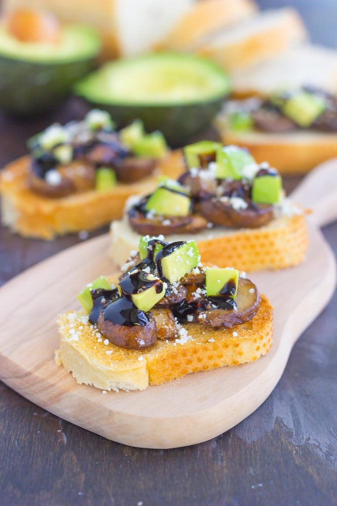 This Mushroom, Avocado and Feta Toast combines fresh mushrooms, ripe avocado and creamy feta cheese, piled high on toasted bread and drizzled with a balsamic glaze. This simple toast makes a deliciously easy appetizer or side dish! #mushrooms #mushroomtoast #mushroomrecipe #avocado #avocadotoast #toast #toastrecipe #appetizer