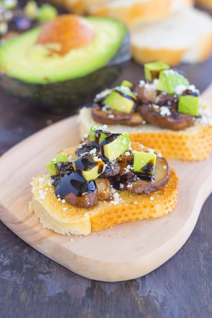 This Mushroom, Avocado and Feta Toast combines fresh mushrooms, ripe avocado and creamy feta cheese, piled high on toasted bread and drizzled with a balsamic glaze. This simple toast makes a deliciously easy appetizer or side dish!