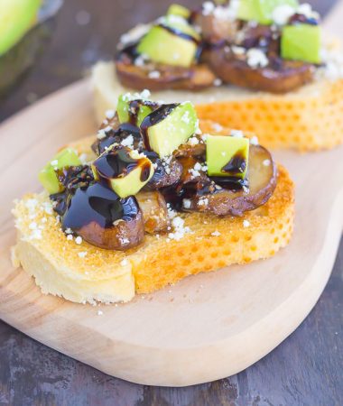 This Mushroom, Avocado and Feta Toast combines fresh mushrooms, ripe avocado and creamy feta cheese, piled high on toasted bread and drizzled with a balsamic glaze. This simple toast makes a deliciously easy appetizer or side dish!