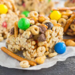 These No-Bake Sweet and Salty Cereal Bars are perfect for when those cravings strike. Filled with Honey Nut Cheerios, honey roasted peanuts, pretzels, and chocolate candies, these bars are the perfect combination of sweet and salty. With no oven required and minimal ingredients, you can have these bars prepped and ready to be devoured in no time!