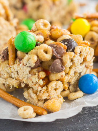These No-Bake Sweet and Salty Cereal Bars are perfect for when those cravings strike. Filled with Honey Nut Cheerios, honey roasted peanuts, pretzels, and chocolate candies, these bars are the perfect combination of sweet and salty. With no oven required and minimal ingredients, you can have these bars prepped and ready to be devoured in no time!