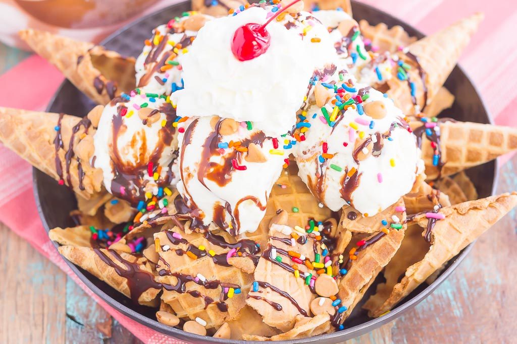 Peanut Butter Ice Cream Sundae Nachos are a deliciously sweet treat for everyone to enjoy. Crunchy waffle cones are sprinkled with sweet ice cream and all of the fun, sundae toppings. Easy to make and and even better to eat, these nachos make the best dessert during the warmer months!