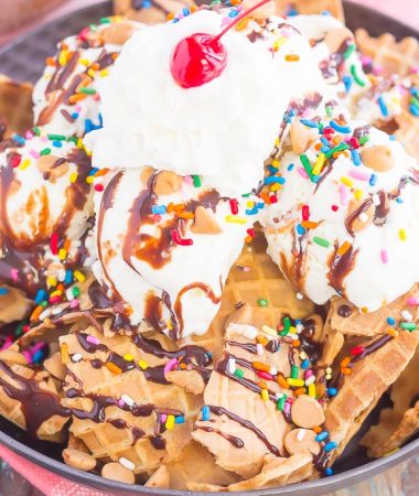 Peanut Butter Ice Cream Sundae Nachos are a deliciously sweet treat for everyone to enjoy. Crunchy waffle cones are sprinkled with sweet ice cream and all of the fun, sundae toppings. Easy to make and and even better to eat, these nachos make the best dessert during the warmer months!