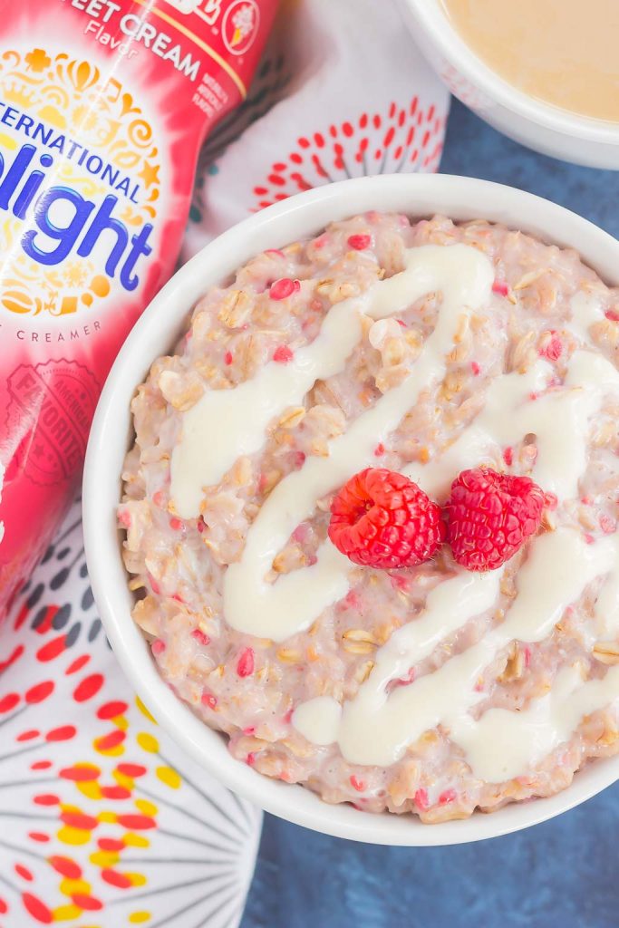 This simple and delicious Raspberry Cheesecake Swirl Oatmeal features hearty oats, fresh raspberries, and a swirl of creamy cheesecake. Easy to make, full of flavor, and on the healthier side, dessert for breakfast never tasted so good! #oatmeal #oatmealrecipe #raspberryoatmeal #cheesecakeoatmeal #breakfast #healthybreakfast