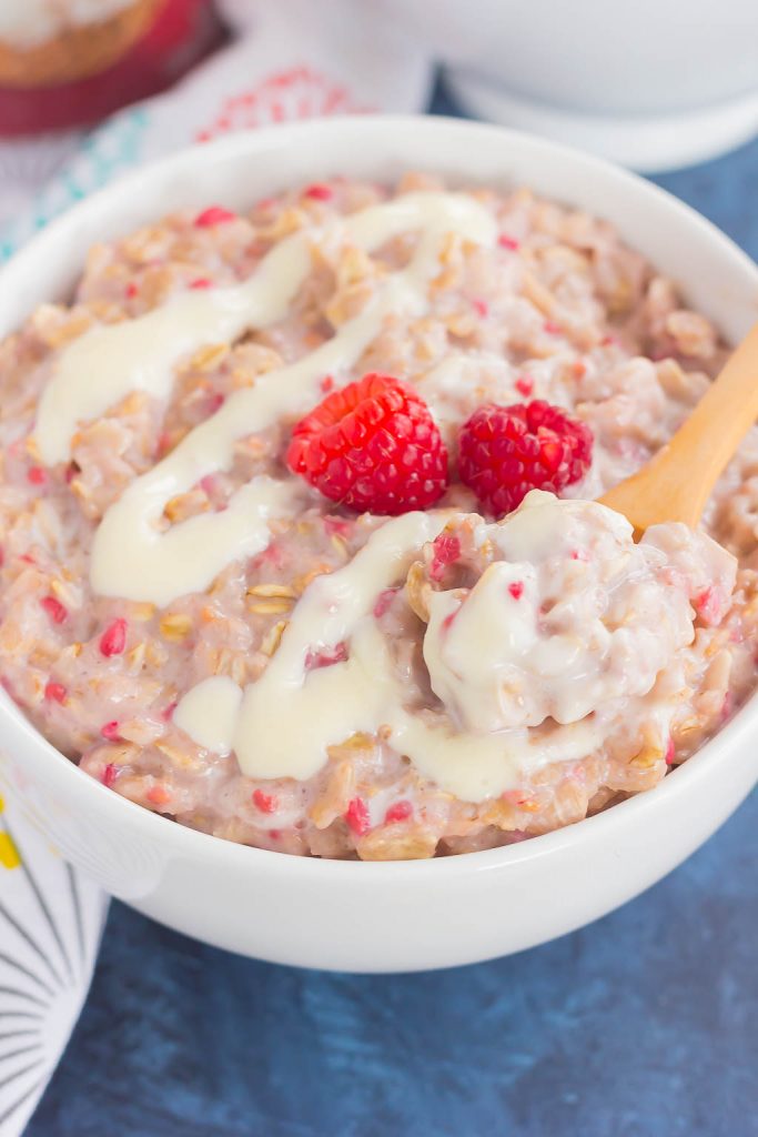 This simple and delicious Raspberry Cheesecake Swirl Oatmeal features hearty oats, fresh raspberries, and a swirl of creamy cheesecake. Easy to make, full of flavor, and on the healthier side, dessert for breakfast never tasted so good!