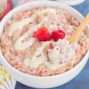 This simple and delicious Raspberry Cheesecake Swirl Oatmeal features hearty oats, fresh raspberries, and a swirl of creamy cheesecake. Easy to make, full of flavor, and on the healthier side, dessert for breakfast never tasted so good!