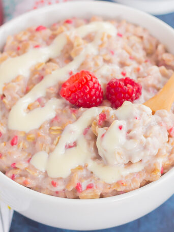 This simple and delicious Raspberry Cheesecake Swirl Oatmeal features hearty oats, fresh raspberries, and a swirl of creamy cheesecake. Easy to make, full of flavor, and on the healthier side, dessert for breakfast never tasted so good!