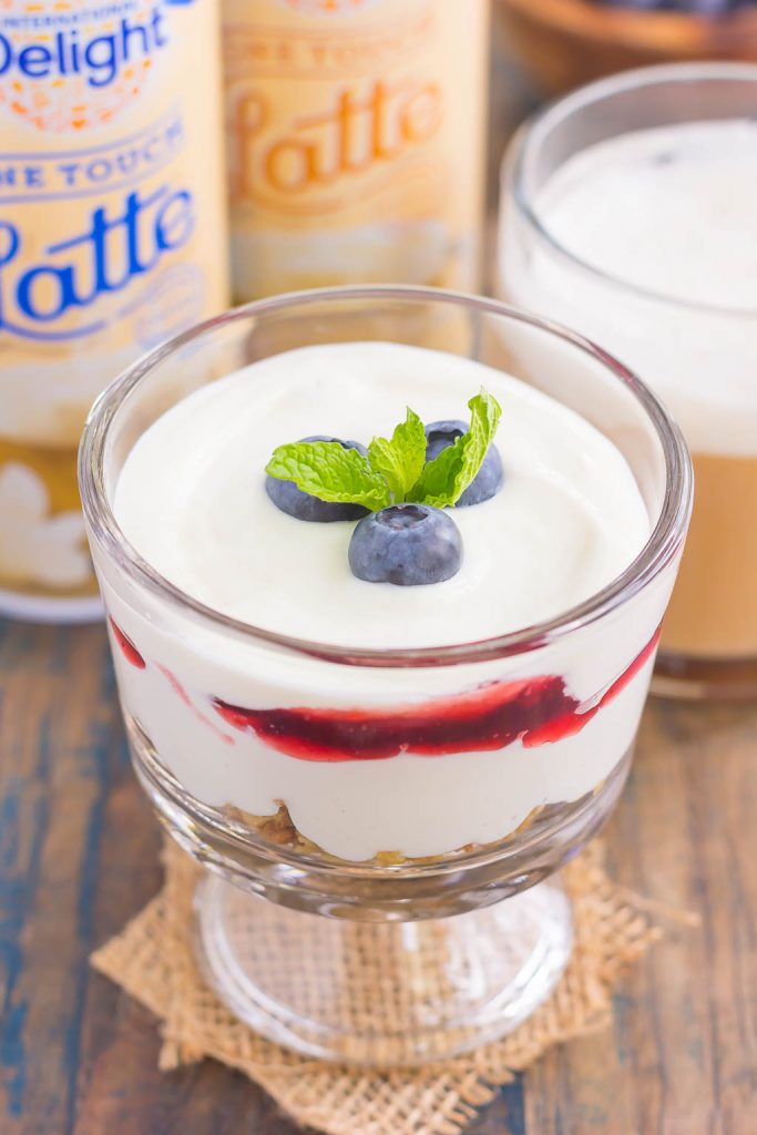 This Blueberry Cheesecake Breakfast Parfait is the best way to start the day. Vanilla Greek yogurt is infused with cream cheese and then layered with blueberries for the ultimate parfait. Light, creamy, and packed with flavor, this easy breakfast or snack is perfect for everyone!