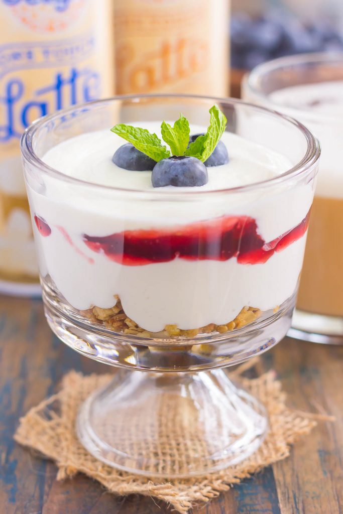 This Blueberry Cheesecake Breakfast Parfait is the best way to start the day. Vanilla Greek yogurt is infused with cream cheese and then layered with blueberries for the ultimate parfait. Light, creamy, and packed with flavor, this easy breakfast or snack is perfect for everyone!