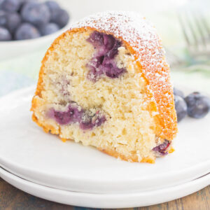 Fresh blueberries and creamy blueberry yogurt give this Blueberry Yogurt Cake a deliciously moist texture, full of blueberry flavor!
