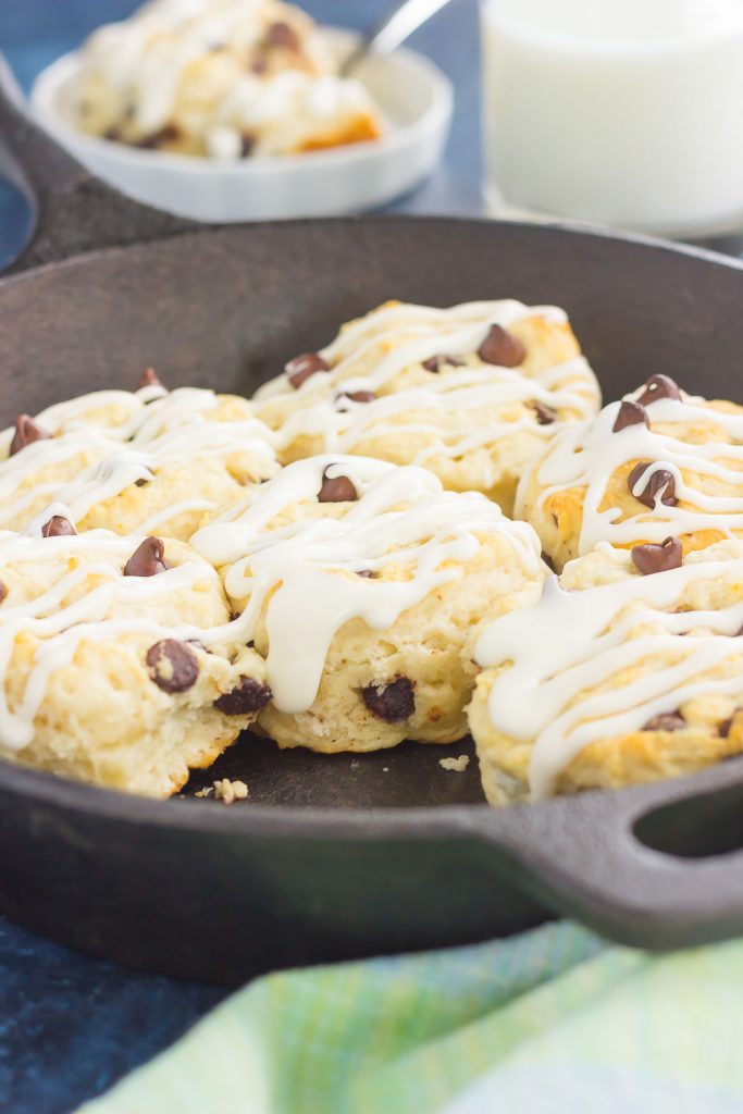 These Chocolate Chip Biscuits are light, fluffy, and filled with sweet chocolate chips. Easy to make and ready in less than 30 minutes, this simple dish is perfect for breakfast or dessert! #biscuits #chocolatechip #chocolatechipbiscuits #biscuitrecipe #breadrecipe #sidedish #breakfast