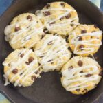 These Chocolate Chip Biscuits are light, fluffy, and filled with sweet chocolate chips. Easy to make and ready in less than 30 minutes, this simple dish is perfect for breakfast or dessert!
