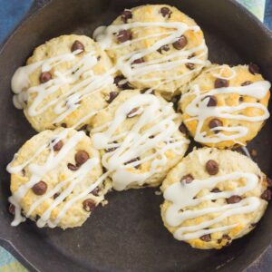 These Chocolate Chip Biscuits are light, fluffy, and filled with sweet chocolate chips. Easy to make and ready in less than 30 minutes, this simple dish is perfect for breakfast or dessert!