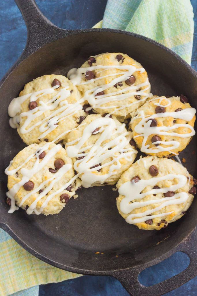 These Chocolate Chip Biscuits are light, fluffy, and filled with sweet chocolate chips. Easy to make and ready in less than 30 minutes, this simple dish is perfect for breakfast or dessert!