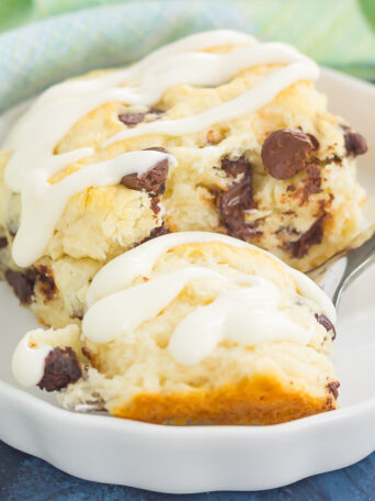 These Chocolate Chip Biscuits are light, fluffy, and filled with sweet chocolate chips. Easy to make and ready in less than 30 minutes, this simple dish is perfect for breakfast or dessert!