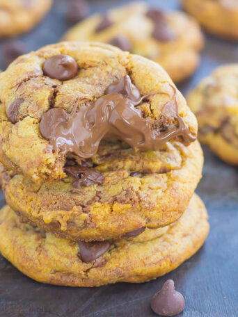 These Nutella Stuffed Chocolate Chip Cookies are sure to satisfy your sweet tooth. Loaded with creamy Nutella and rich chocolate, you'll be baking these over and over again!