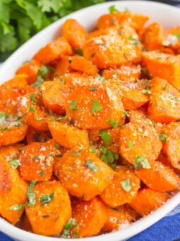 These Parmesan Honey Roasted Carrots make a deliciously easy side dish that's ready in no time. Packed with sweet and savory flavors and roasted until tender, these carrots are fresh, flavorful and perfect alongside any dish!