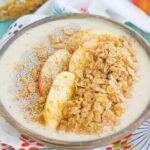 This Apple Cinnamon Smoothie Bowl is a delicious way to cure those breakfast or snack cravings. Filled with good-for-you ingredients and topped with cinnamon cereal, apples, and granola, this bowl is easy to make and bursting with flavor!