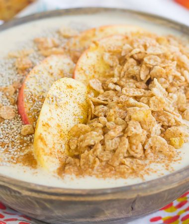 This Apple Cinnamon Smoothie Bowl is a delicious way to cure those breakfast or snack cravings. Filled with good-for-you ingredients and topped with cinnamon cereal, apples, and granola, this bowl is easy to make and bursting with flavor!