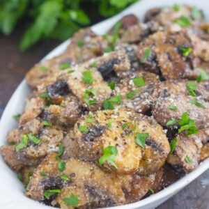 These Baked Parmesan Garlic Mushrooms are seasoned to perfection with garlic, basil, and Parmesan cheese. Easy to prepare and even better to eat, you will be making this side dish all the time!