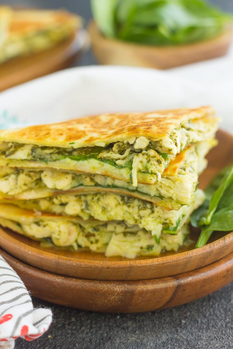 Delicious stack of chicken and spinach pesto quesadillas.