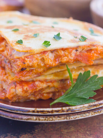 Perfect for a Friday night or anytime that want a quick meal, these Easy Pizza Quesadillas are sure to become a regular on your meal rotation!