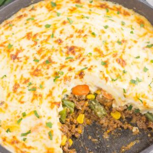 This Easy Shepherd's Pie features a unique spin on the classic version and is ready in less than 20 minutes. Loaded with zesty ground beef, cheddar cheese, mixed veggies, and topped with creamy, cheesy mashed potatoes, this is the ultimate comfort dish for everyone to enjoy!