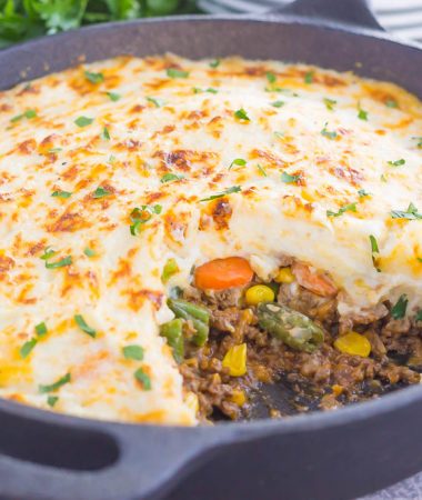 This Easy Shepherd's Pie features a unique spin on the classic version and is ready in less than 20 minutes. Loaded with zesty ground beef, cheddar cheese, mixed veggies, and topped with creamy, cheesy mashed potatoes, this is the ultimate comfort dish for everyone to enjoy!