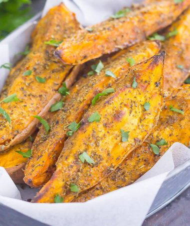 These Garlic Herb Sweet Potato Wedges are loaded with flavor and baked until crispy and golden. Made with just a few simple ingredients and ready in no time, these wedges are the perfect side dish for just about any meal!