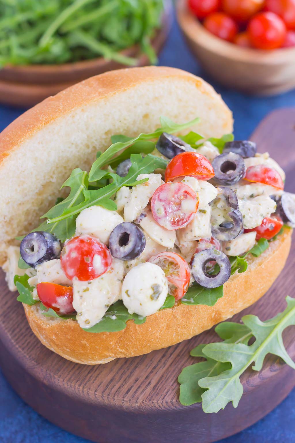 A sub roll filled with Italian chicken salad. 