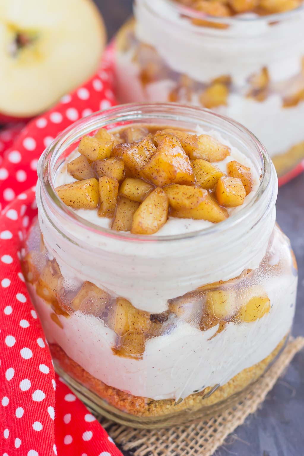 This No-Bake Apple Cinnamon Cheesecake features a creamy, apple spice batter that's layered on top of crushed graham crackers and topped with tender, cinnamon and brown sugar apples. It's an easy treat that's ready in no time and perfect for fall!