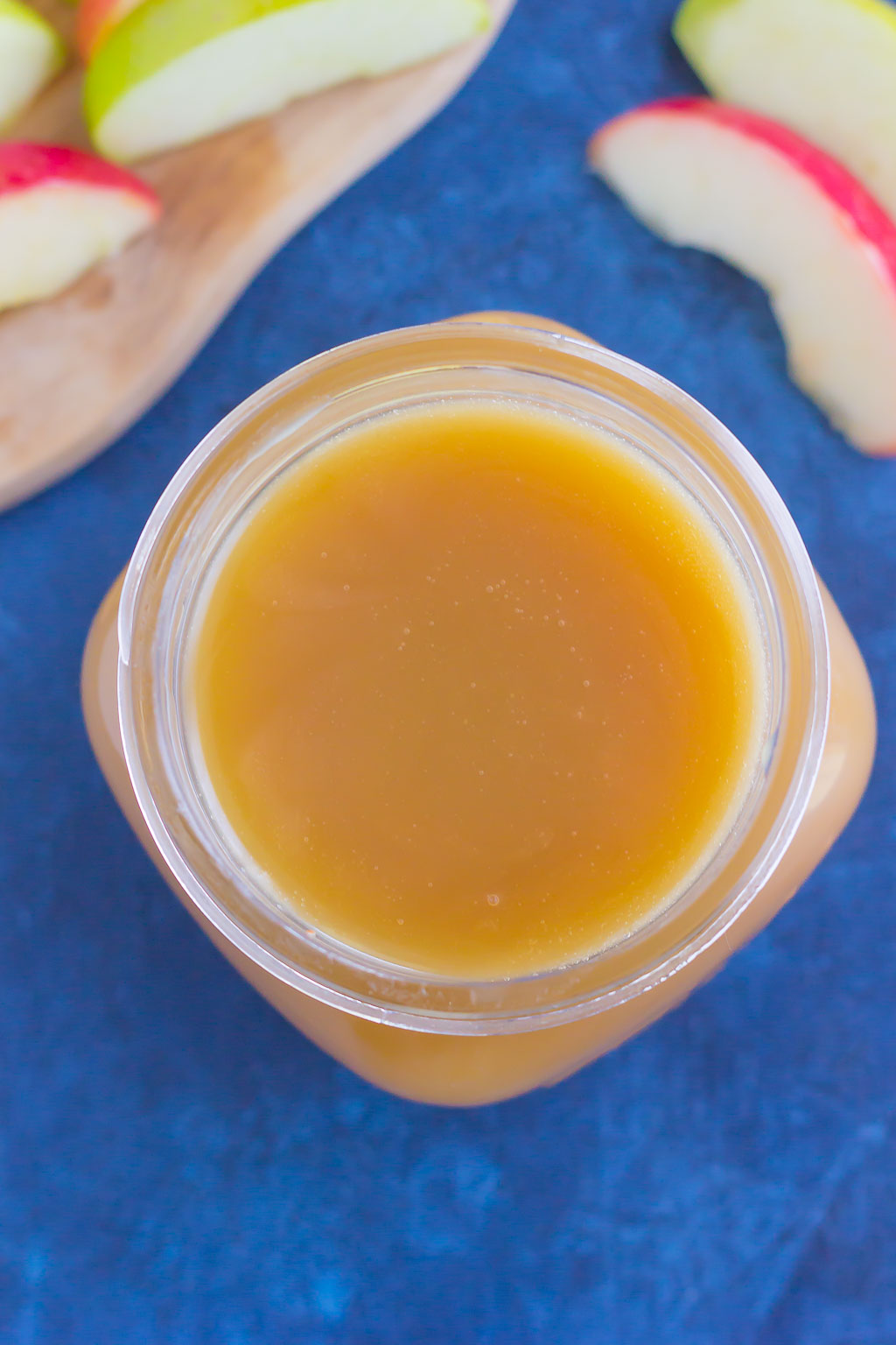 Sweet, smooth, and full of flavor, this Salted Caramel Sauce is just itching to be poured over ice cream, drizzled over pancakes, or eaten with spoon! #caramel #caramelsauce #caramelrecipe #saltedcaramelsauce #saltedcaramelrecipe #saltedcaramel #fallrecipe #falldessert #icecreamtopping 