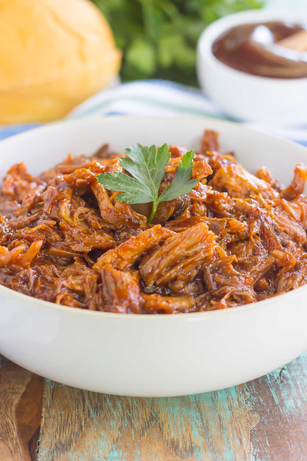 Slow Cooker Barbecue Pulled Pork in white bowl 