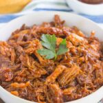 Moist, tender, and full of flavor, this Slow Cooker Barbecue Pulled Pork makes a tasty sandwich or delicious entree when made in the slow cooker!