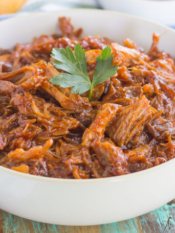 This Slow Cooker Barbecue Pulled Pork is made with just a few ingredients, almost no prep work, and makes the most delicious meal!