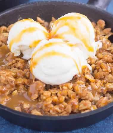 caramel apple crisp with vanilla ice cream on top