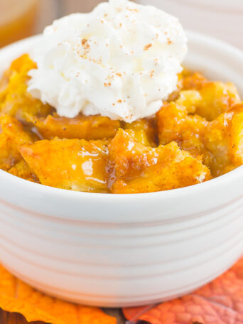 This Pumpkin Bread Pudding with Brown Sugar Caramel Sauce is warm, cozy, and perfect for dessert. It's easy to make, packed with simple ingredients, and topped with an easy caramel sauce. This pumpkin dish is guaranteed to be a favorite all year long!