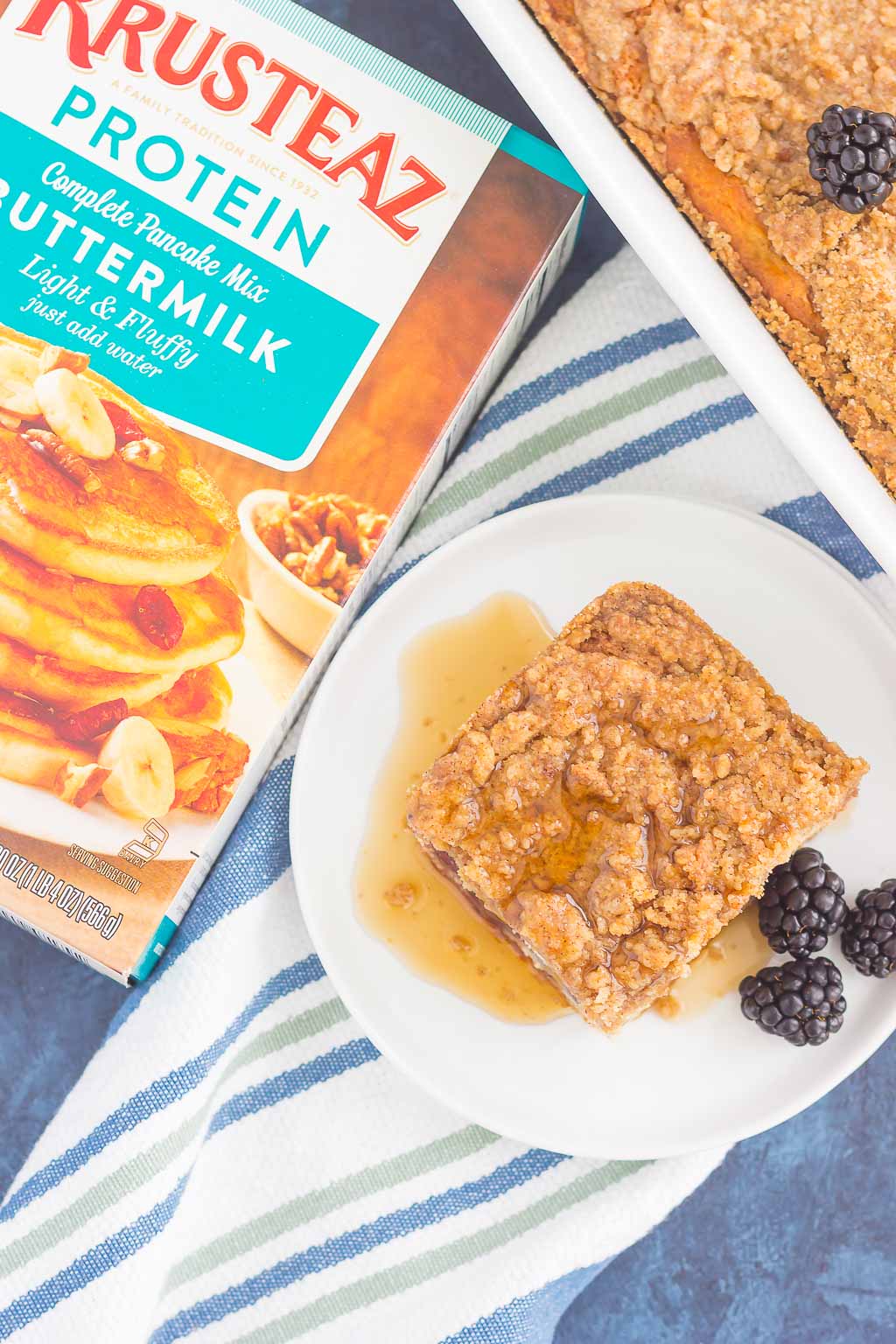 This Blackberry Streusel Pancake Casserole is an easy dish that the whole family will enjoy. Fluffy, buttermilk pancake batter is studded with fresh blackberries and then topped with cinnamon streusel. Baked until golden and bursting with flavor, this comfort dish is the ultimate breakfast!