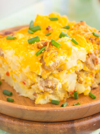 Loaded with fluffy eggs, sausage bites, hash brown potatoes, and cheese, this tasty Sausage and Hash Brown Breakfast Casserole comes together in minutes and is sure to be a favorite dish!