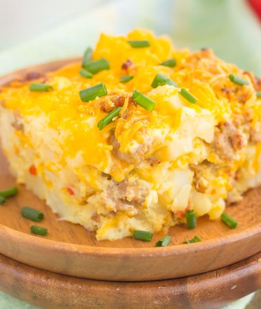 Loaded with fluffy eggs, sausage bites, hash brown potatoes, and cheese, this tasty Sausage and Hash Brown Breakfast Casserole comes together in minutes and is sure to be a favorite dish!