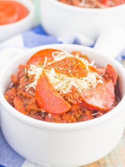 This Slow Cooker Pizza Chili is loaded with ground beef, Italian sausage, pepperoni, and zesty spices. It's a fun twist on a classic comfort dish that will keep you coming back for more!