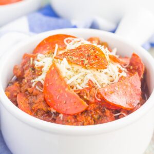 This Slow Cooker Pizza Chili is loaded with ground beef, Italian sausage, pepperoni, and zesty spices. It's a fun twist on a classic comfort dish that will keep you coming back for more!