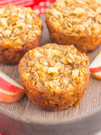These Apple Cinnamon Baked Oatmeal Cups are the perfect, on-go-the breakfast to enjoy any day of the week. Fresh apples, a sprinkling of cinnamon, and hearty oats make a deliciously cozy dish to enjoy throughout the season!