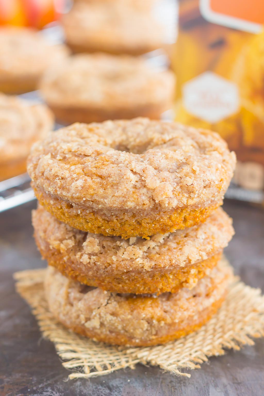 These Baked Pumpkin Streusel Donuts are soft, fluffy, and bursting with pumpkin. Filled with cozy fall flavors and topped with a sweet cinnamon streusel, this easy treat is the perfect fall breakfast or dessert!