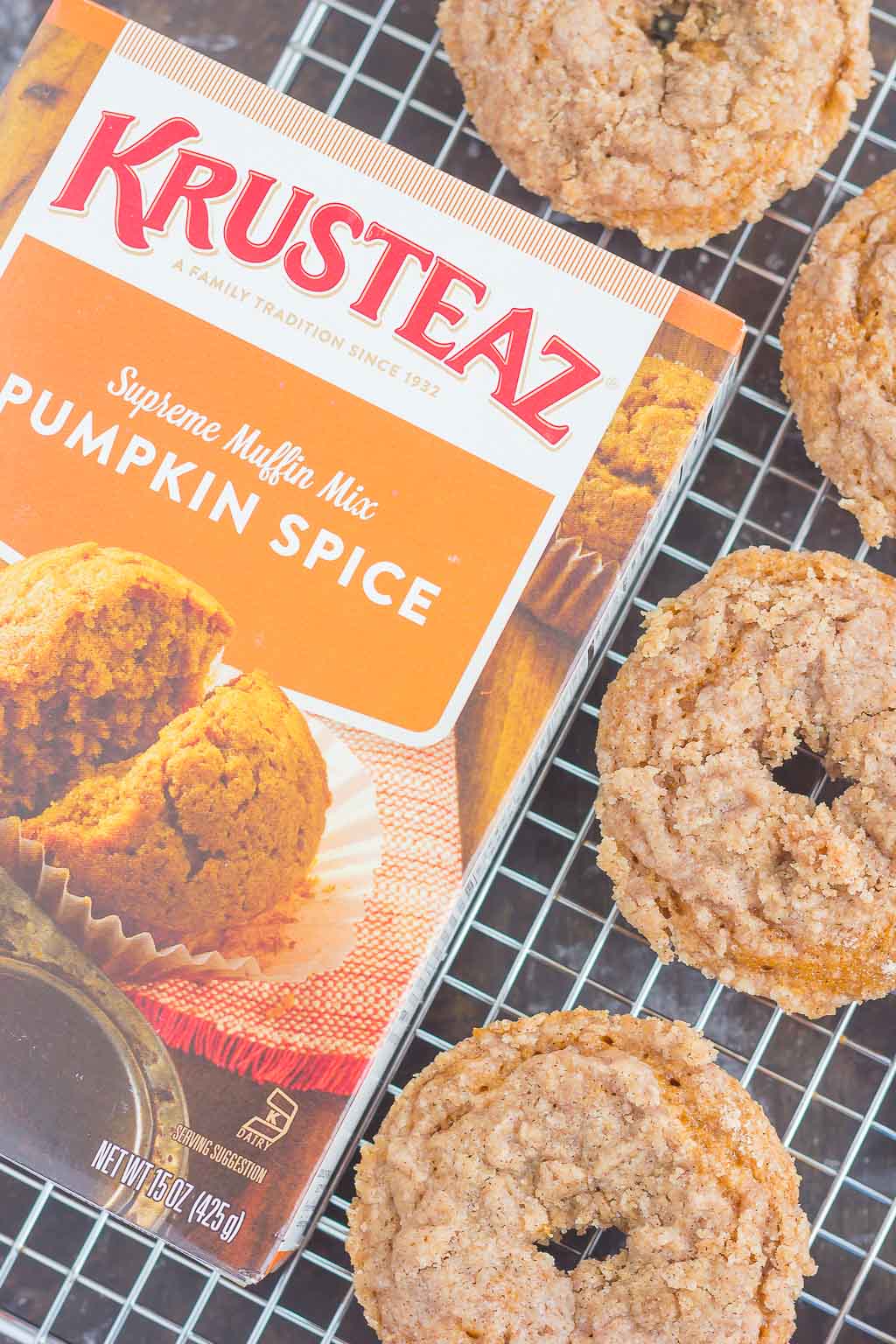 These Baked Pumpkin Streusel Donuts are soft, fluffy, and bursting with pumpkin. Filled with cozy fall flavors and topped with a sweet cinnamon streusel, this easy treat is the perfect fall breakfast or dessert!