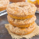 These Baked Pumpkin Streusel Donuts are soft, fluffy, and bursting with pumpkin. Filled with cozy fall flavors and topped with a sweet cinnamon streusel, this easy treat is the perfect fall breakfast or dessert!