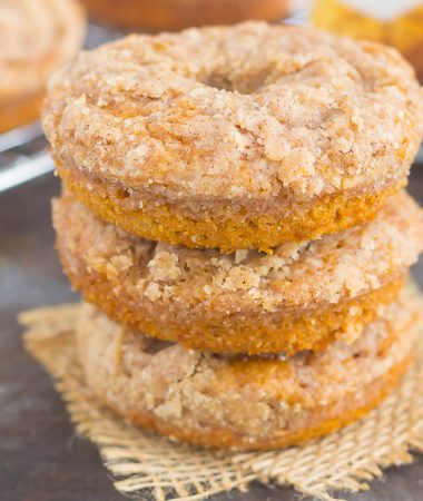 These Baked Pumpkin Streusel Donuts are soft, fluffy, and bursting with pumpkin. Filled with cozy fall flavors and topped with a sweet cinnamon streusel, this easy treat is the perfect fall breakfast or dessert!