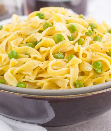 These Creamy Skillet Noodles with Peas are made in one pan and ready in less than 30 minutes. With just a few ingredients, this creamy and flavorful side dish is perfect when paired with just about anything!