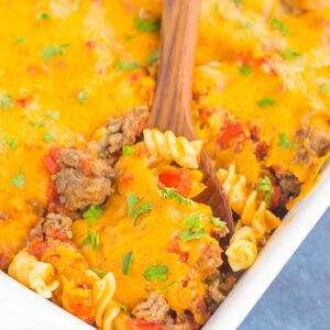 This Cheeseburger Casserole is loaded with the flavors of a classic cheeseburger, but in comfort food form. Tender pasta, seasoned ground beef, and a sprinkling of spices and cheese make this dish a family favorite for dinner!