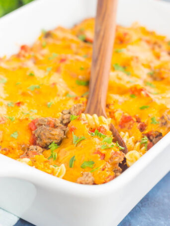 This Cheeseburger Casserole is loaded with the flavors of a classic cheeseburger, but in comfort food form. Tender pasta, seasoned ground beef, and a sprinkling of spices and cheese make this dish a family favorite for dinner!